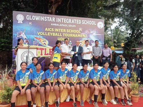 Under-17 Girls Volleyball Team on securing the Runners-Up Trophy at the AICS Volleyball Tournament held at Glowinstar Integrated School, Udupi